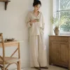 A beige shirt paired with beige wide-leg pants set for women's casual commuting looks slimming and drooping details Picture